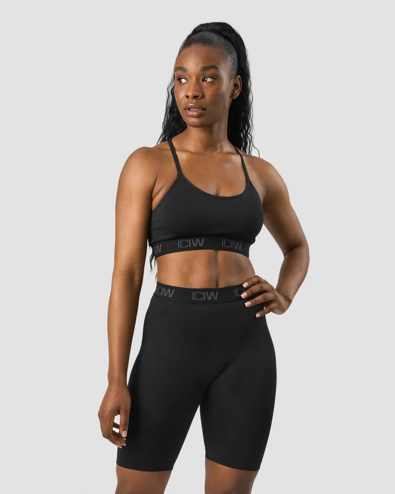 DEFINE SEAMLESS LOGO STRAPPY SPORTS BRA BLACK