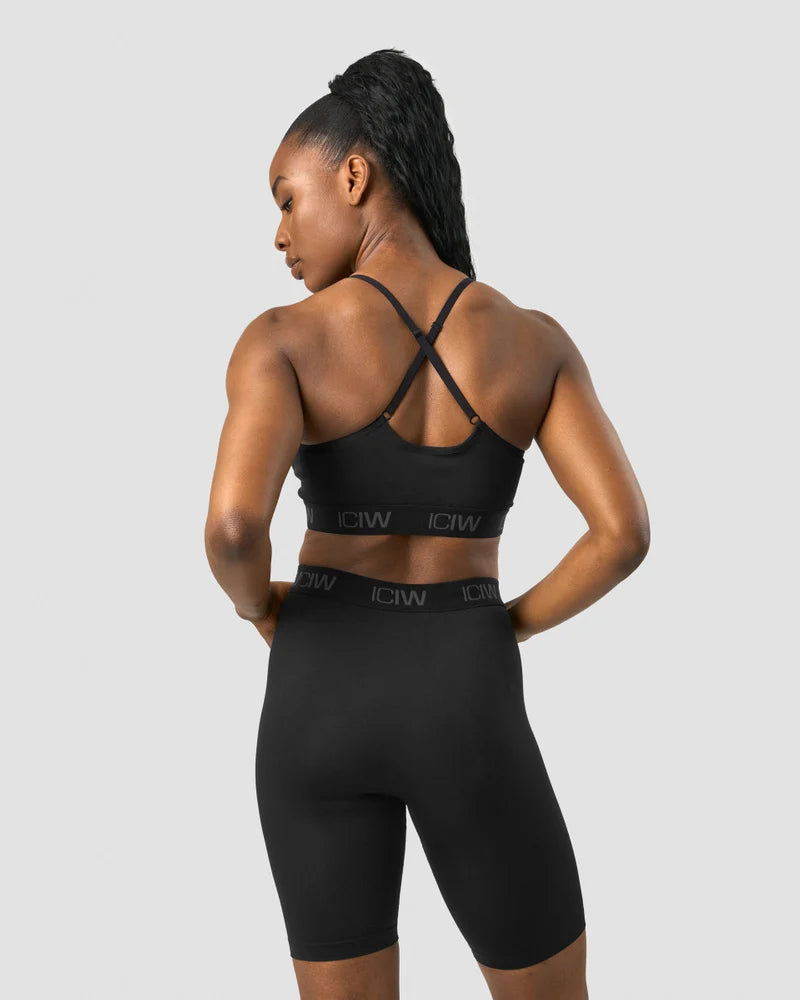 DEFINE SEAMLESS LOGO STRAPPY SPORTS BRA BLACK