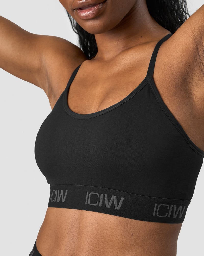 DEFINE SEAMLESS LOGO STRAPPY SPORTS BRA BLACK