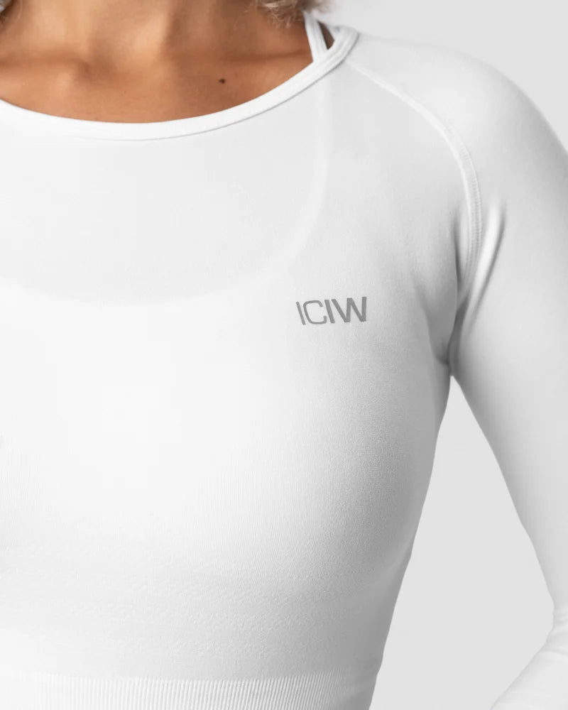 ICANIWILL DEFINE SEAMLESS LS CROP TOP WHITE