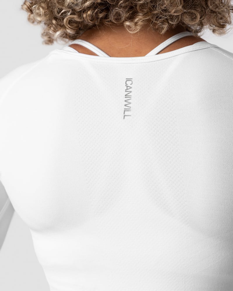 ICANIWILL DEFINE SEAMLESS LS CROP TOP WHITE